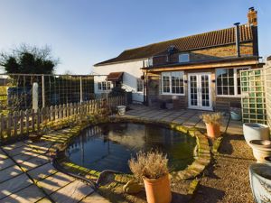 Rear elevation. ornamental pond- click for photo gallery